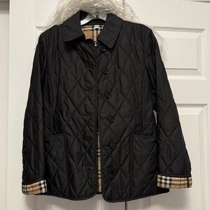 SOLD!!! Like New Burberry quilted jacket with classic check interior